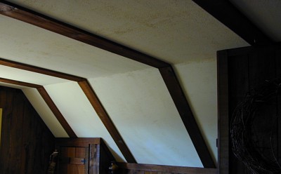 Primitive Country Home - Angled Ceiling in Bedroom